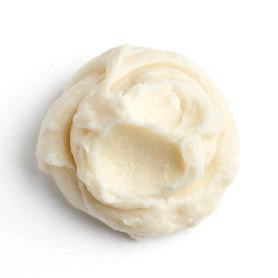 raw shea butter texture and jar — kälm xo body butter ingredient